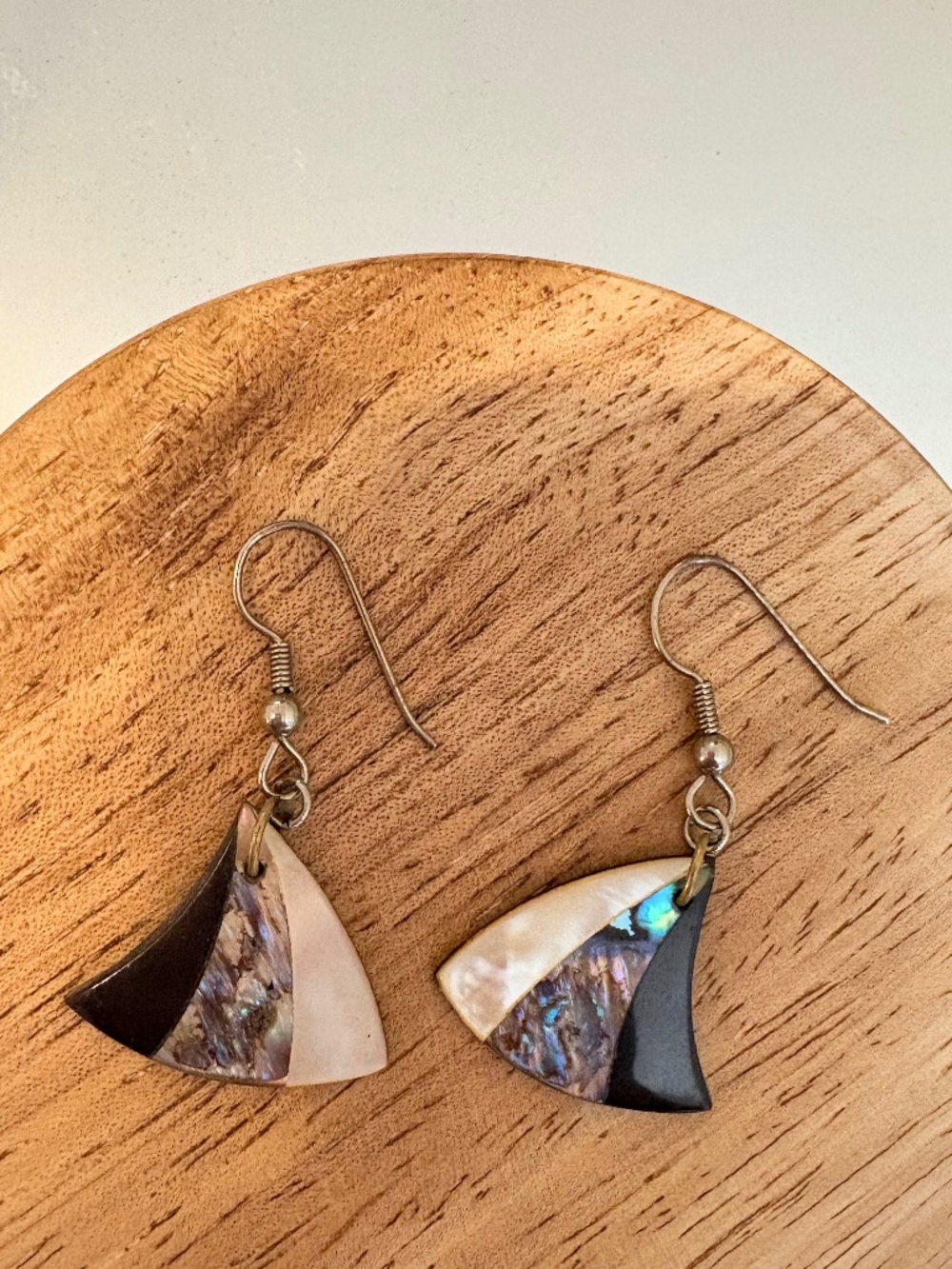 Beautiful abalone shell earrings with white and black opal stone detail